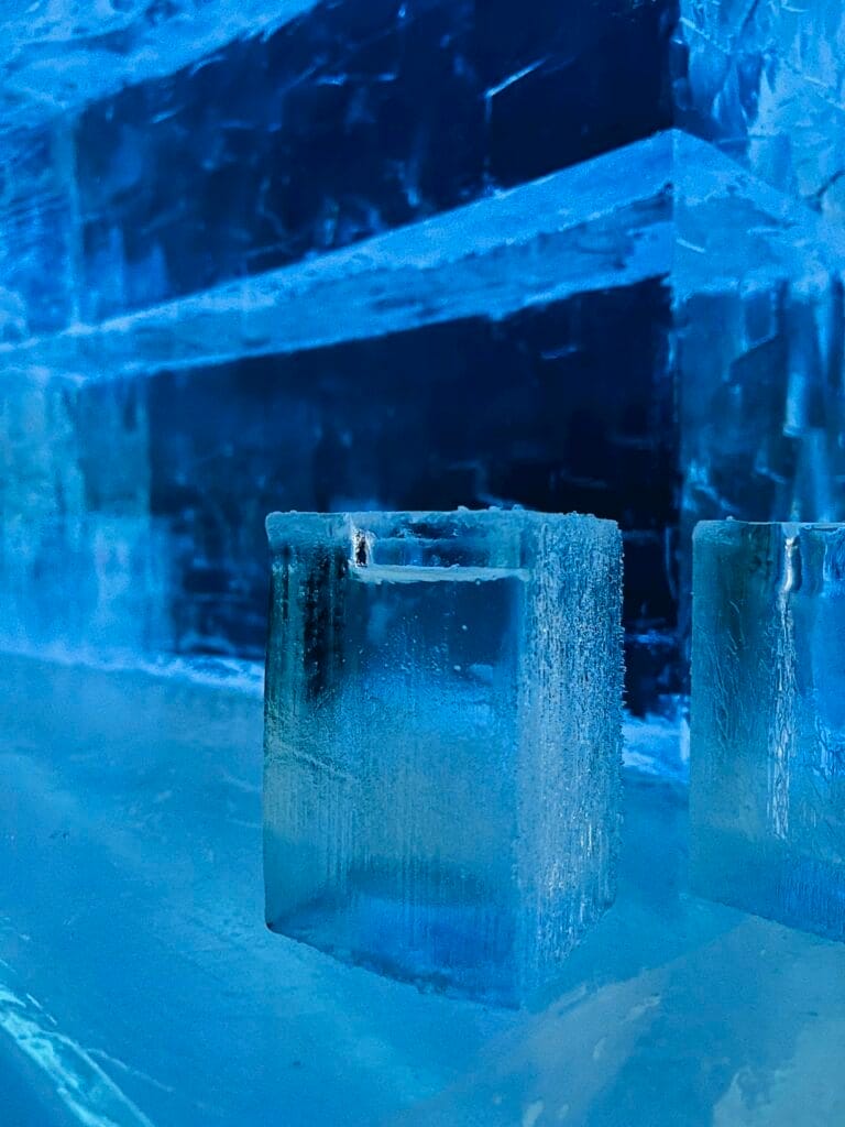Close up of drink in glass made of ice in ice bar in Stockholm Sweden
