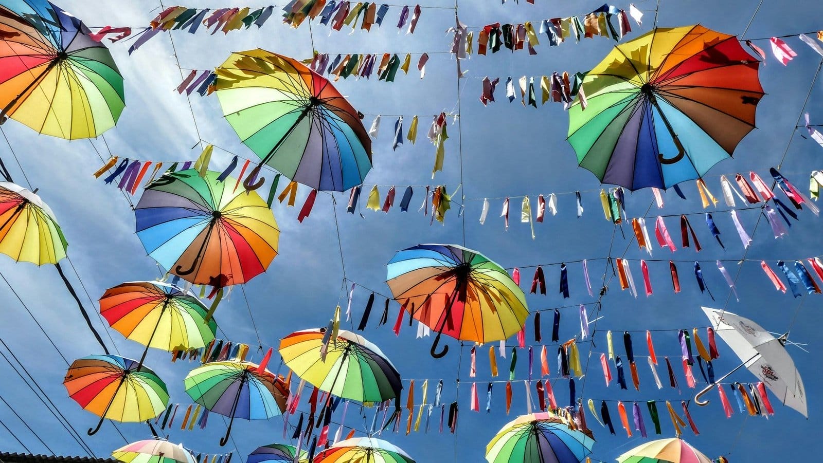 Low angle shot of colorful umbrella decorations in the city of Porto de Galinhas, Brazil