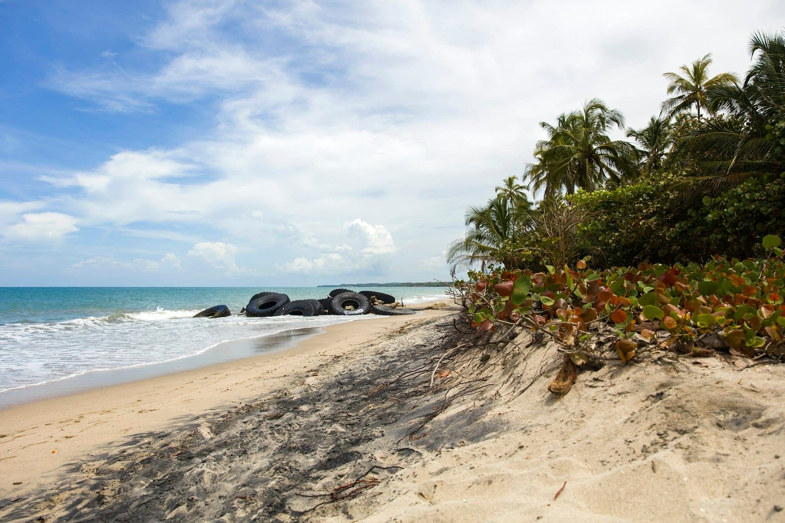 Tires on the tropical sandy beach