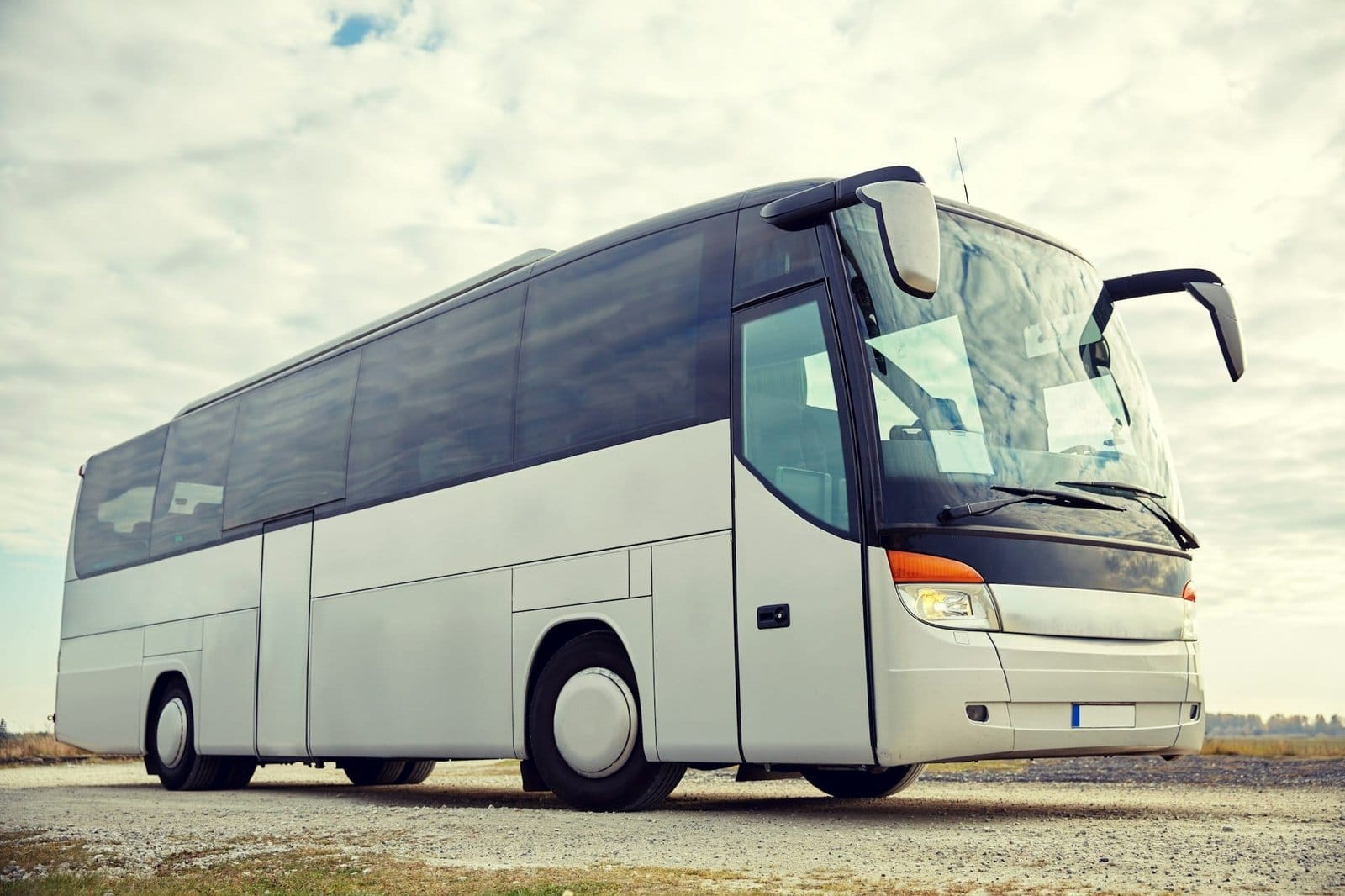 tour bus driving outdoors