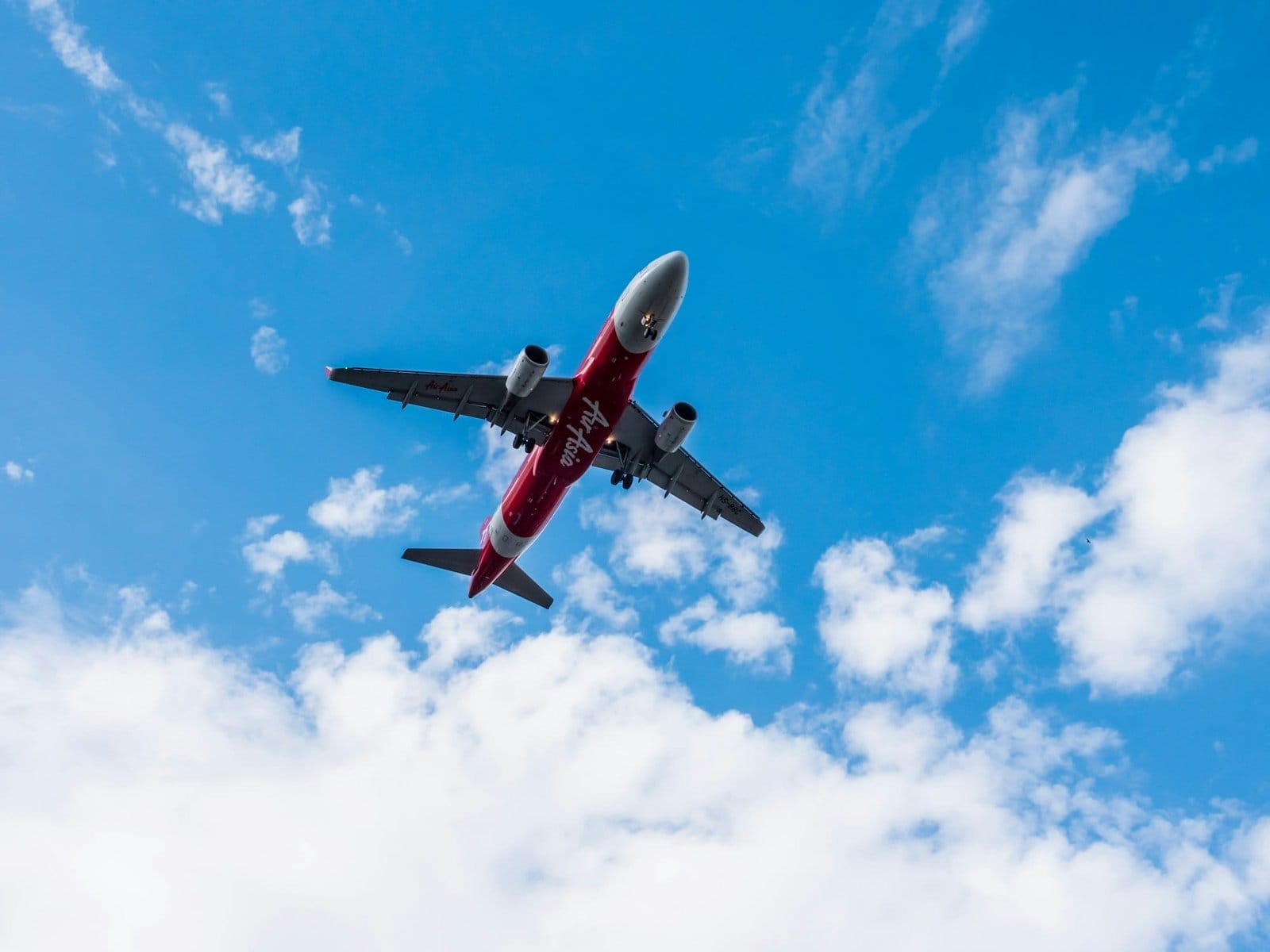 Airplane flying on blue sky
