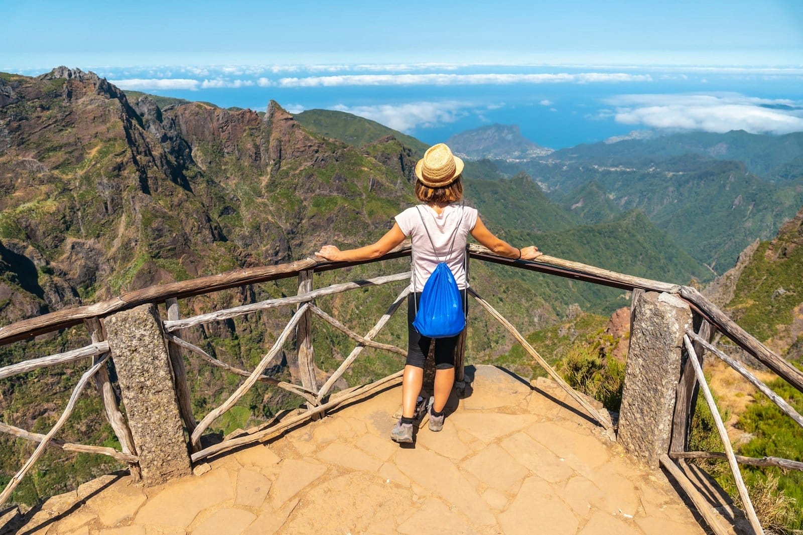 A young girl at the Ninho da Manta viewpoint on Pico do Arieiro, Madeira. Portugal