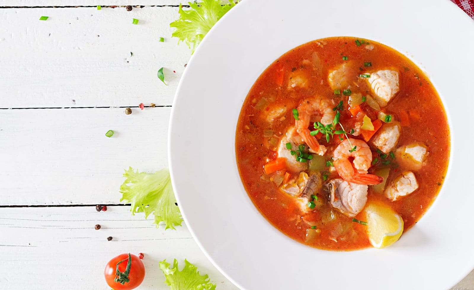 Brazilian food: Moqueca capixaba of fish and bell peppers in spicy coconut sauce