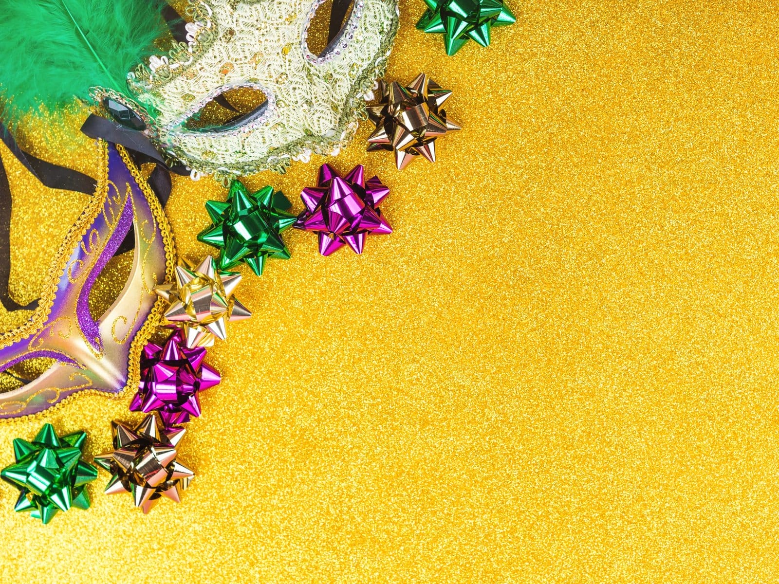 Carnival mardi gras party masks on gold background