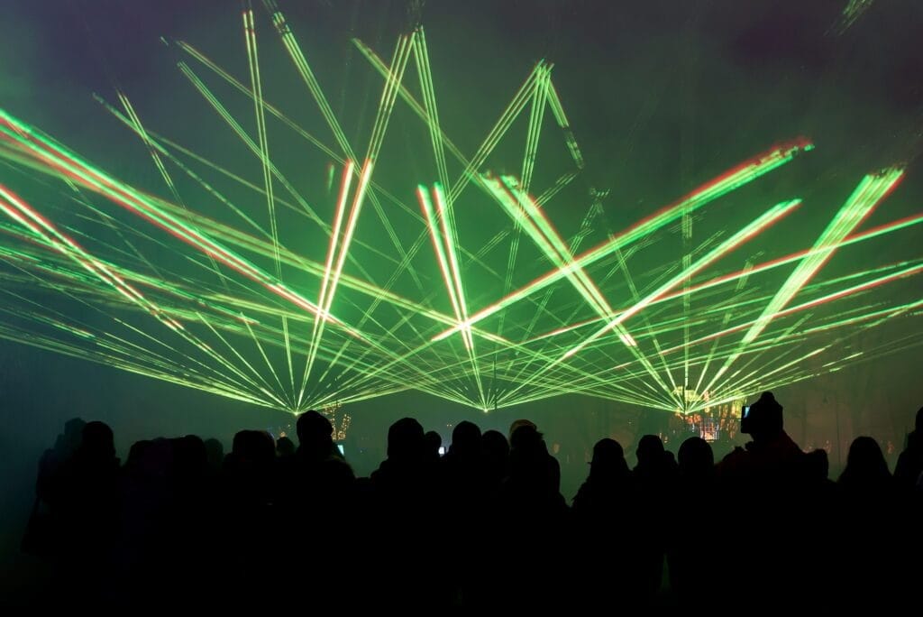 Night laser show with audience