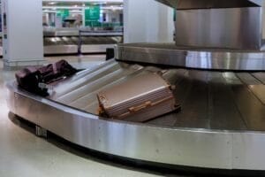 Baggage claim in the suitcases on a luggage band on the airport