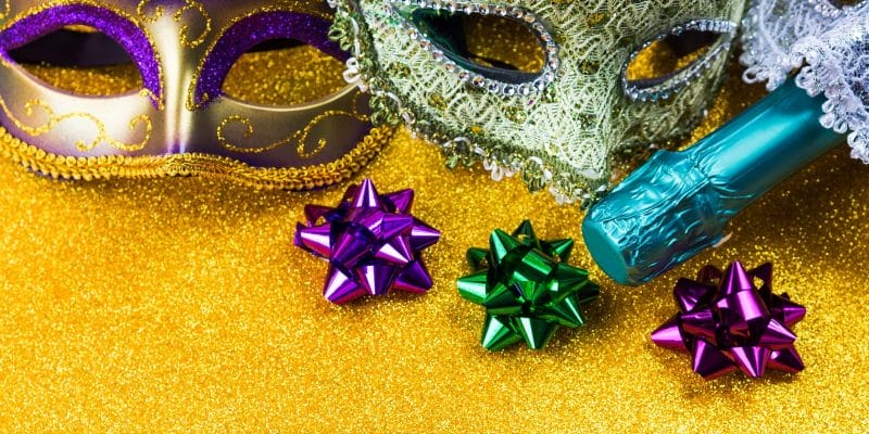Carnival mardi gras party masks on gold background