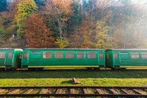 Railway train at abandoned train station in Carpathia Mountains,
