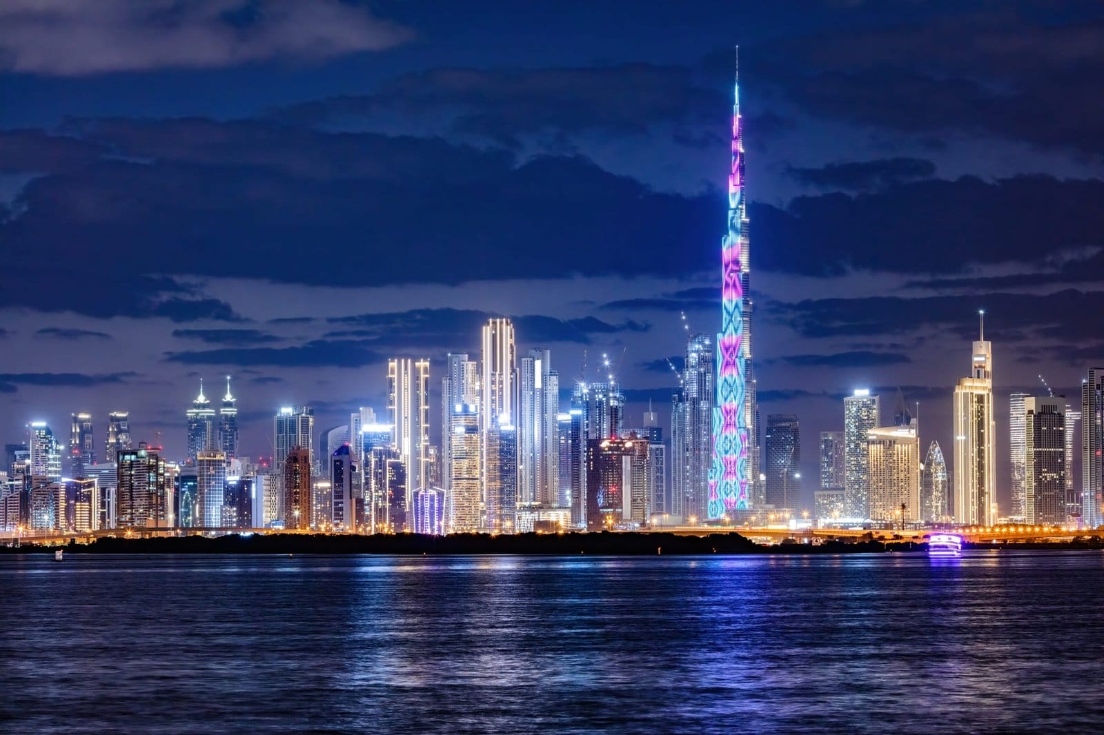 Skyscrapers skyline of Dubai UAE downtown with Burj Khalifa at night