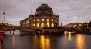 Bode museum illuminated, Spree river, museum island, Berlin, at night