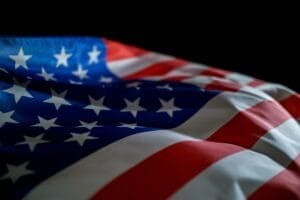 USA flag on black background.