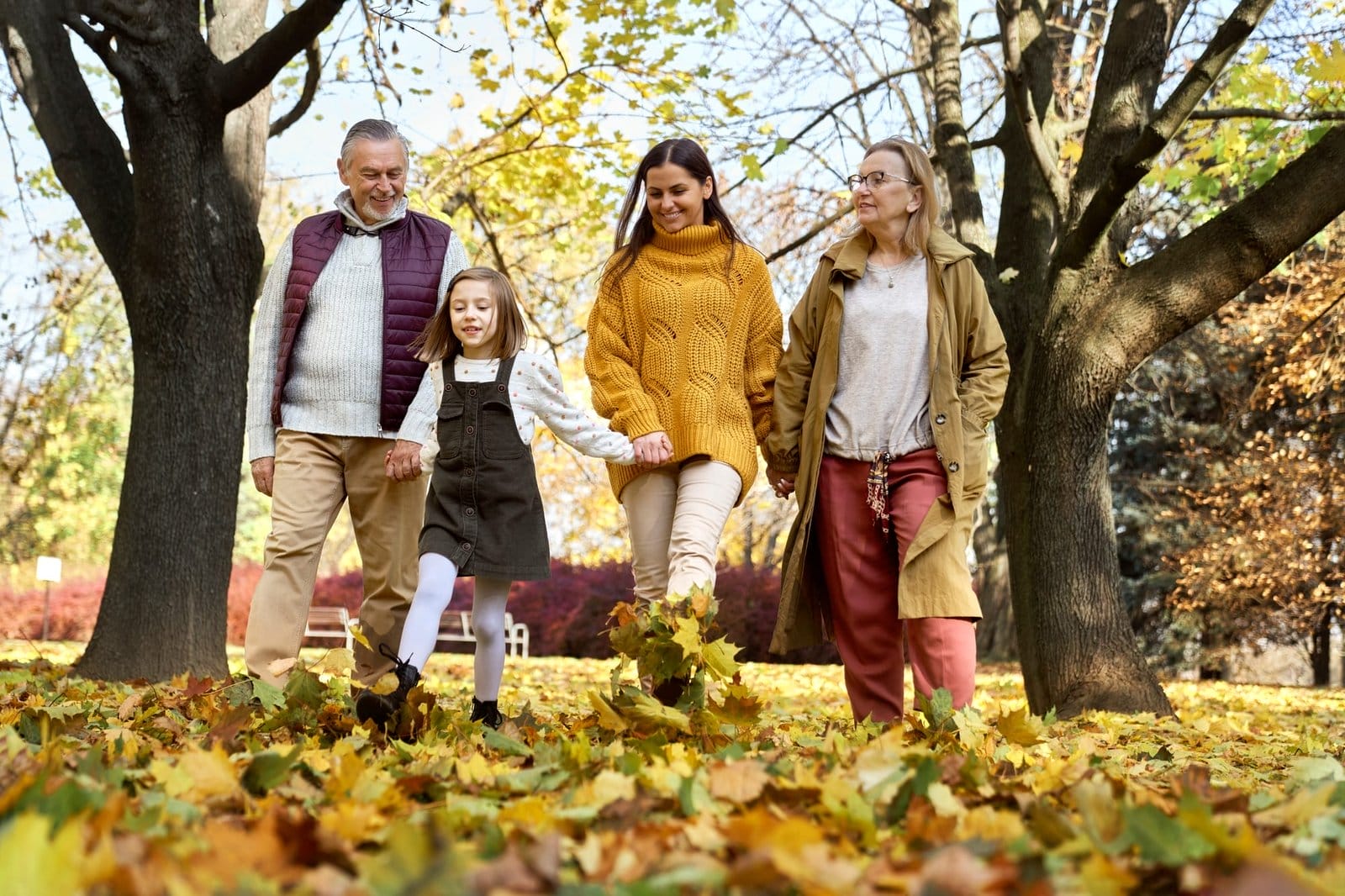 Family walking at the park in autumn